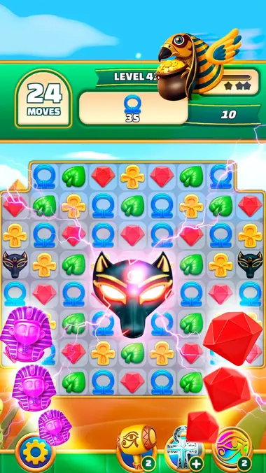 Gods & Gems: livello con maschere di Anubi e amuleti da allineare